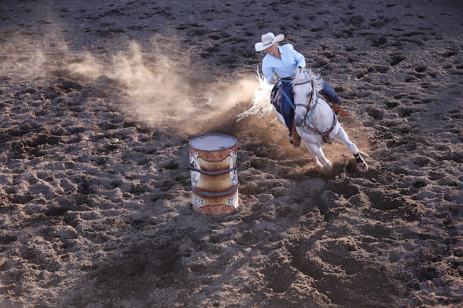 barrel racing cowgirl